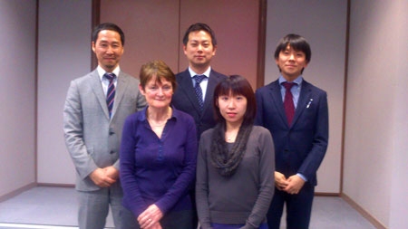 with the colleagues of his department